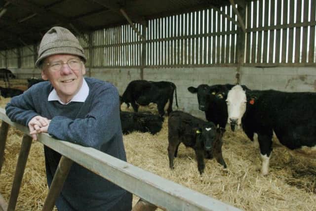 Chris Haskins with cattle on his farm  at Skidby, near Hull