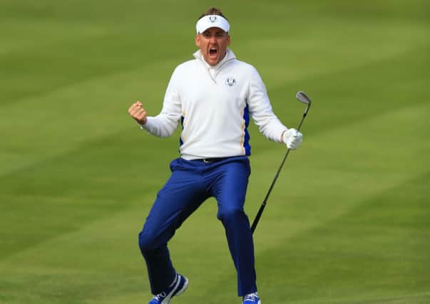 Europe's Ian Poulter celebrates chipping in from off the green during day two of the 40th Ryder Cup.