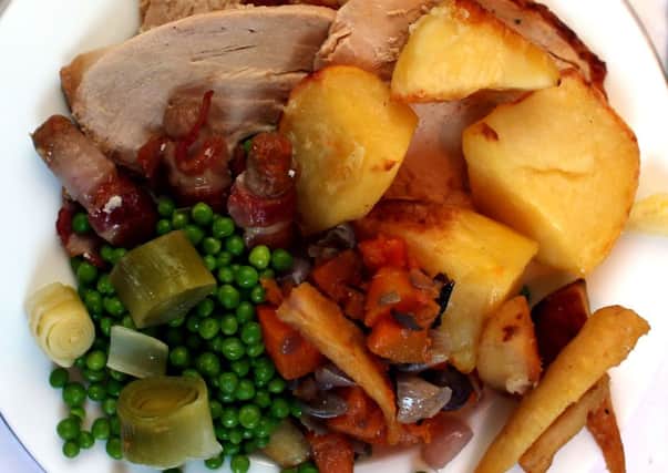 A third of people will keep an eye on the TV while tucking into their Christmas dinner this year