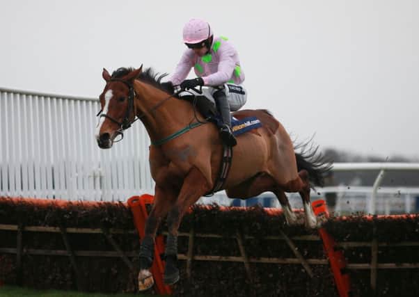 Faugheen, ridden by Ruby Walsh, jumps the last on their way to victory in the Christmas Hurdle at Kempton. Picture: David Davies/PA.