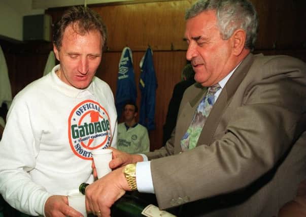 Champaigne times, for Howard Wilkinson, left and Leslie Silver when Leeds United won the First Division Championship