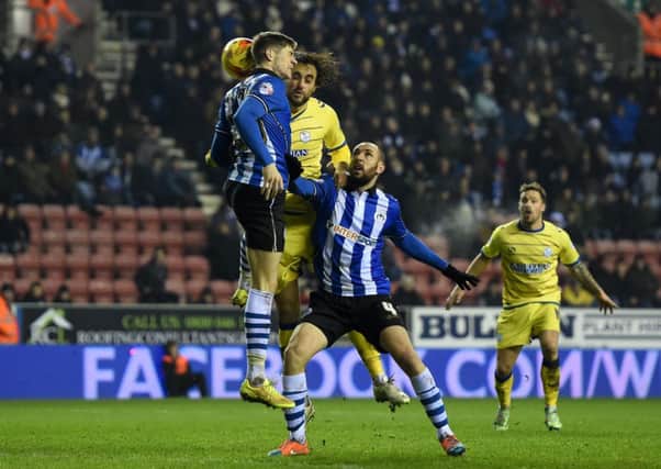 Sheffield Wednesday's Atdhe Nuhiu scores the only goal of the game against Wigan Athletic (Picture: Martin Rickett/PA Wire).