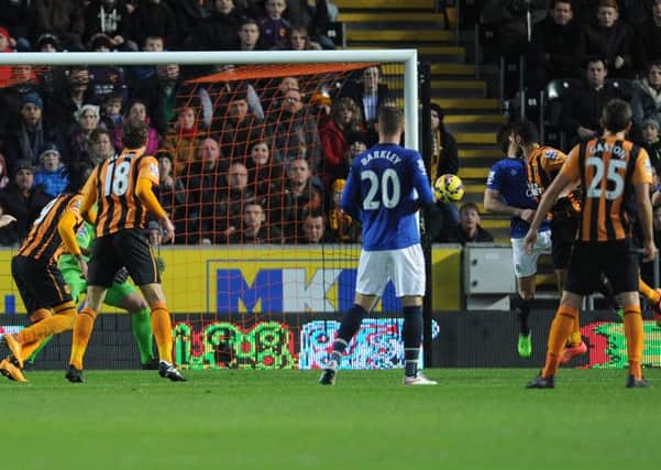 Hull City's Ahmed Elmohamady scores the Tigers' first goal in the 2-0 win over Everton. Picture: Anna Gowthorpe/PA.