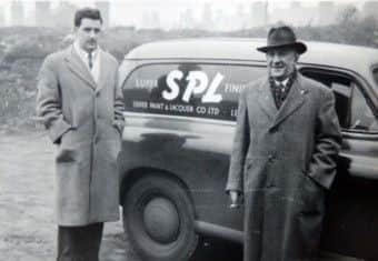 Leslie Silver with his father and a Silver Paints van
