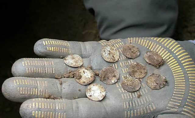 Members of the Weekend Wanderers Detecting Club uncovered an inredible hoard of silver Anglo Saxon coins worth more than £1 million.  Picture: Ross Parry  Agency