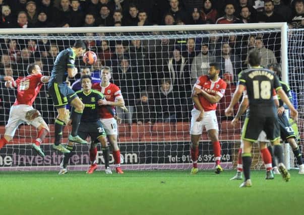 Daniel Ayala makes it 2-0 to Middlesbrough by heading home from Grant Leadbitters corner in the third-round encounter against Barnsley at Oakwell (Picture: Keith Turner).