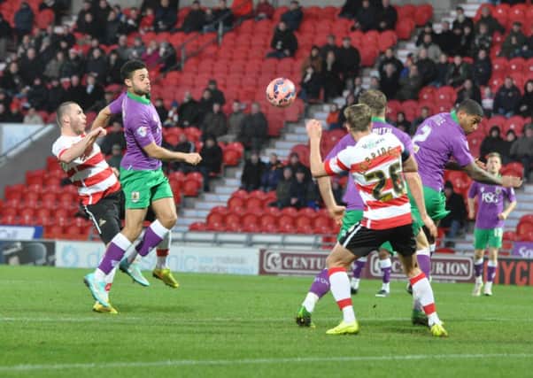 Luke McCullough heads his first goal for Doncaster Rovers to give them the lead against Bristol City (Picture:  Steve Uttley).