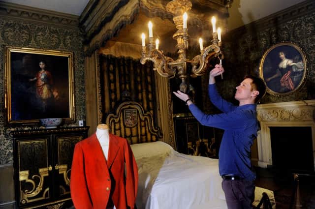 Tom Johnson, House Steward at the Treasurers House in York, in the Queens Room  where Princess Alexandra stayed in 1900