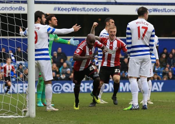 Sheffield United's Jamal Campbell-Ryce (centre) celebrates scoring his sides second goal of the game at Loftus Road. Picture: Nigel French/PA