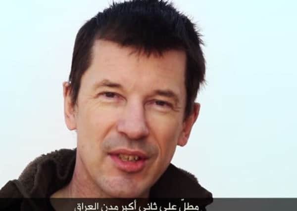 Undated video grab taken from YouTube believed to be of John Cantlie, which Islamic State (IS) have released