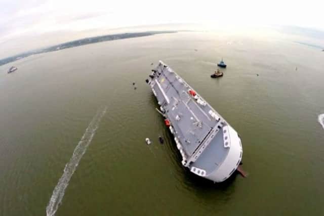 The car carrier Hoegh Osaka after she became stranded on Bramble Bank, in the Solent between Southampton and the Isle of Wight.