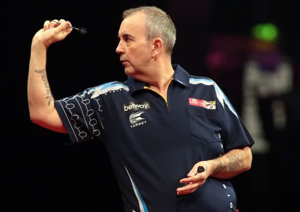 Phil 'The Power' Taylor is one of the players in action during the 2015 Premier League.