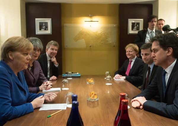 Ed Miliband meets with German Chancellor Angela Merkel