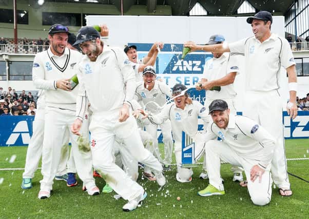 CHAMPAGNE MOMENT: Yorkshires Kane Williamson, second left, tries to avoid the celebratory bubbles with his New Zealand team-mates in Wellington after his man-of-the-match performance saw the hosts enjoy a 2-0 victory in their Test series against Sri Lanka. Picture: Hagen Hopkins/Getty Images.