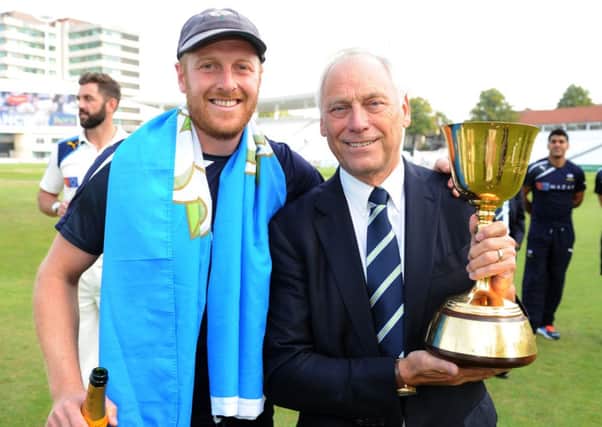 Yorkshire captain Andrew Gale with the club's chairman Colin Graves and the County Championship trophy (Picture: Jonathan Gawthorpe).