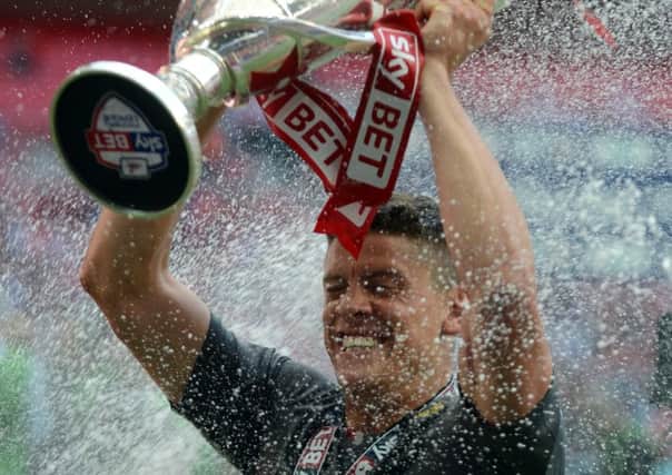 Play-off hero Alex Revell has swapped Rotherham for Cardiff.