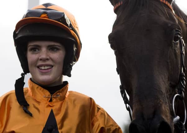 HAPPY: Lizzie Kelly and Tea For Two scored an easy victory in The William Hill Lanzarote Hurdle at Kempton. Picture: Julian Herbert/PA.