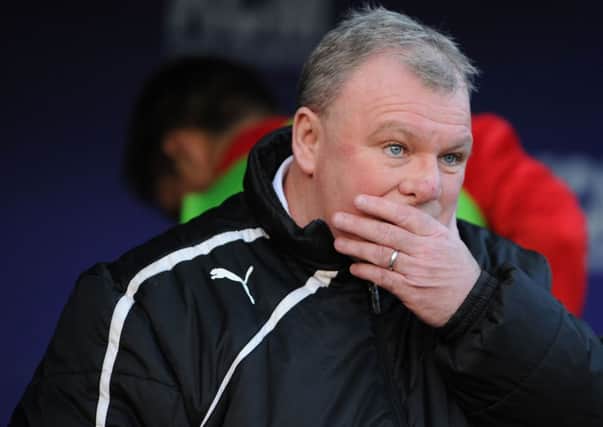 Rotherham Manager Steve Evans during the FA Cup Third Round match at the AESSEAL New York Stadium, Rotherham. PRESS ASSOCIATION Photo. Picture date: Saturday January 3, 2015. See PA Story SOCCER Rotherham. Photo credit should read: Ryan Browne/PA Wire. RESTRICTIONS: Editorial use only. Maximum 45 images during a match. No video emulation or promotion as 'live'. No use in games, competitions, merchandise, betting or single club/player services. No use with unofficial audio, video, data, fixtures or club/league logos.