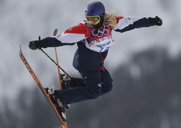 Sheffield's Katie Summerhayes at the 2014 Winter Olympics, is in action at the 2015 world championships next week, alongside her sister Molly. (AP Photo/Sergei Grits)