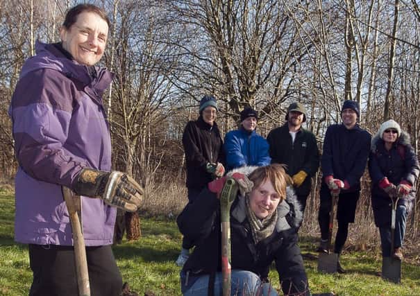 Maureen Edwards and Beatrice Greenfield with Liddy Goyder, Richard Souter Steve Goodacer and Trisha Brutus of Friend of the earth with Tim Shortland of Sheffield City Council Community Forrestry Management begin treeplanting in Greenhill Parkon Sunday 19th Feb

www.pauldaviddrabble.co.uk

19th February 2012 -  Image © Paul David Drabble