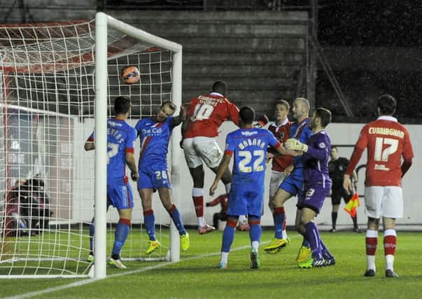 Jay Emmanuel-Thomas scores the first of two goals which enabled Bristol City to beat Doncaster Rovers 2-0 at Ashton Gate last night in their FA Cup third-round replay (Picture: Joe Meredith/JMP).