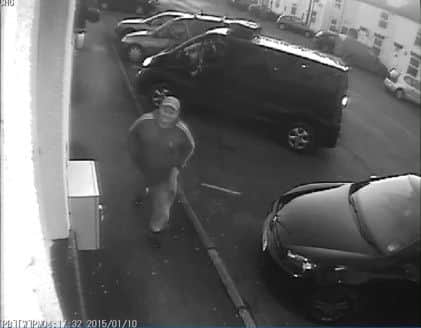 CCTV shows a man stealing a defibrillator from a wall in Bridlington, East Yorkshire.  Pictures: Ross Parry Agency