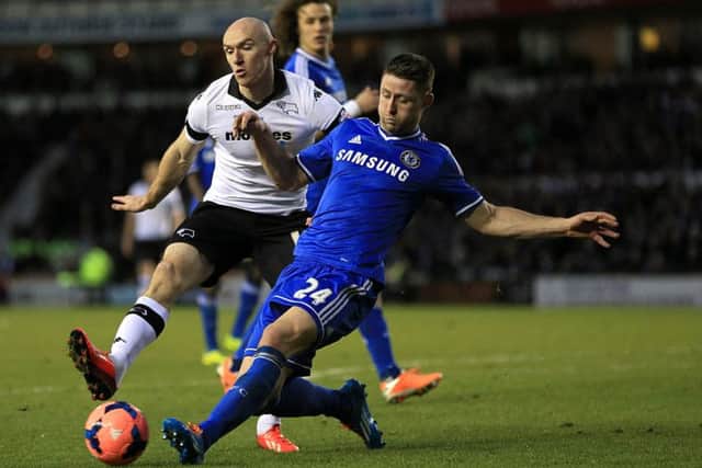 Derby County striker Conor Sammon, in white, has ended a loan spell at Ipswich and joined Rotherham United (Picture: Nick Potts/PA).