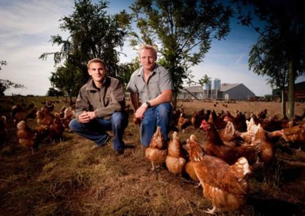 L-R: Adrian and James Potter on the farm.
