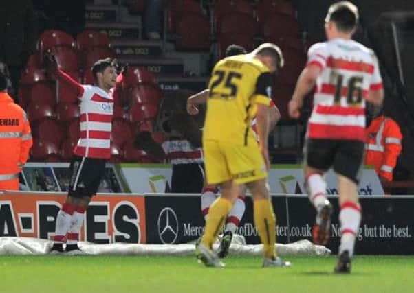 Doncaster substitute Harry Forrester takes the applause after his stunning strike gave his side victory over Barnsley at the Keepmoat.