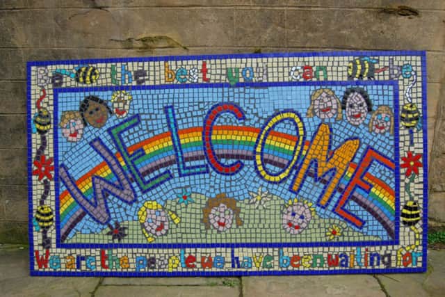 A mosaic made for Cookridge Primary School, with year 5 and 6, for the reception area. Kids design ideas