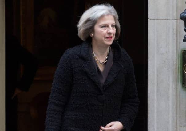 Home Secretary Theresa May leaves No 10 Downing Street