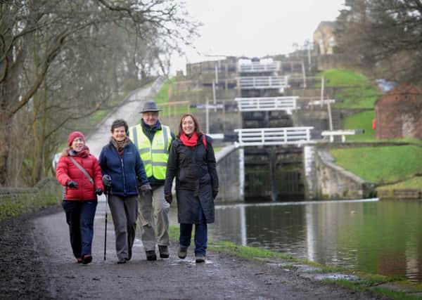 Walkers at Five Rise Locks, Bingley. Picture by Simon Hulme