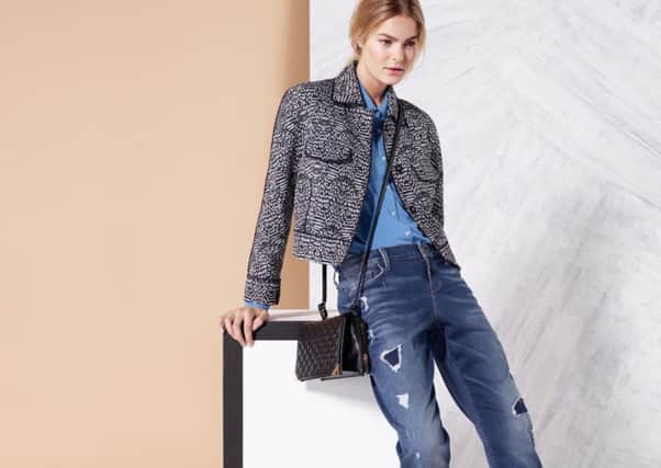 Limited Edition distressed jeans, £39.50; Per Una jacket, £85; top, £22.50; shoes, £25. All from the spring collection at Marks & Spencer. Below, lift, slim and shape bootcut jeans, £45, from Next.