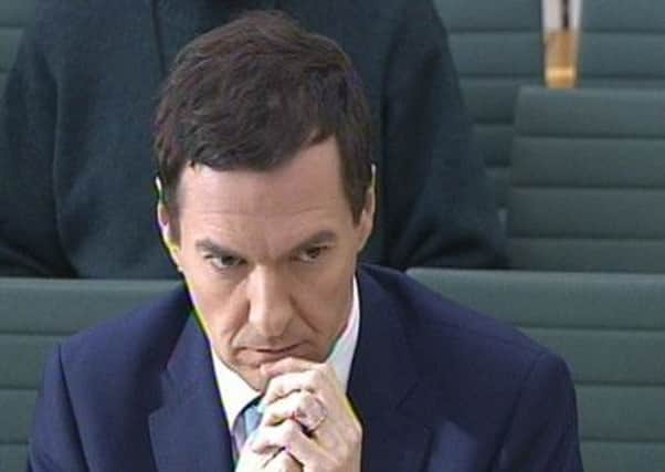 Chancellor of the Exchequer George Osborne answers questions in front of the Treasury Select Committee