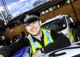 Special Constable Michael Middleton from Leeds wearing a peaked cap