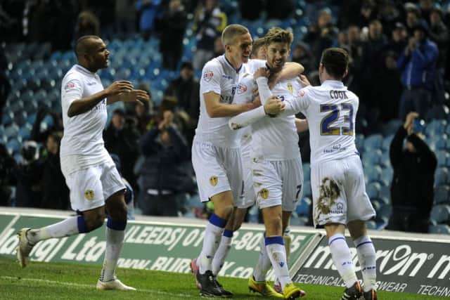 Luke Murphy is lauded by Leeds United team-mates after scoring the goal which proved enough to beat Championship leaders Bournemouth last night (Picture: Bruce Rollinson).