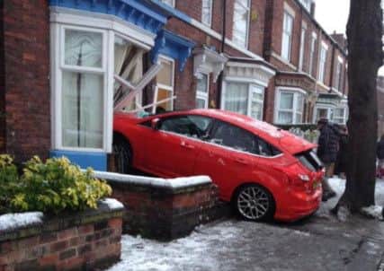 This car ploughed into a house in Sheffield. Pictures: Twitter and Ross Parry Agency