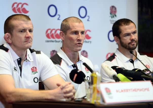 England's Coach Stuart Lancaster (centre) with Graham Rowntree, forwards coach (left) and Andy Farrell (right), backs coach during the press conference at Twickenham Stadium, London.