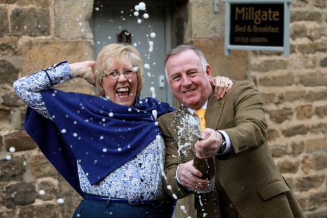 Sue and Andrew Burrell celebrate after finding out their B&B the Millgate, in Masham North Yorkshire, has been named best in the world by Tripadvisor. Picture: Ross Parry Agency
