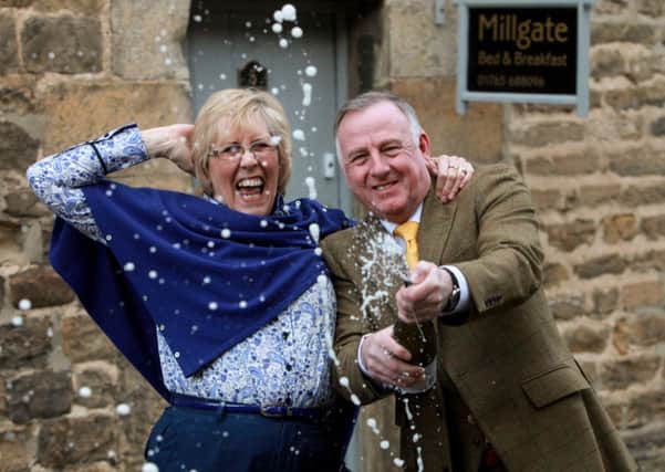 Sue and Andrew Burrell celebrate after finding out their B&B the Millgate, in Masham North Yorkshire, has been named best in the world by Tripadvisor. Picture: Ross Parry Agency