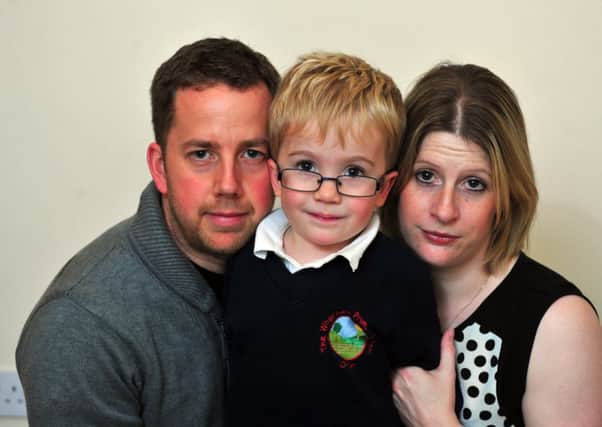 19 November 2014.......         Sam Brown, 6,  with  parents Katy and Simon from Otley. Sam has Morquio syndrome. He is being treated with drugs thanks to a trial in Manchester which have significantly improved his condition but cash for this will run out next month and the NHS is unlikely to pick up the tab.TJ100584h Picture by Tony Johnson