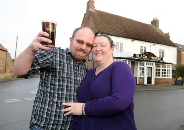 Si and Jo Millner, landlords of the Black Horse pub, Tollerton.