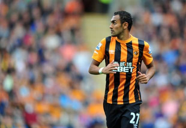 Hull City player Ahmed Elmohamady hired a taxi to take his wallet home