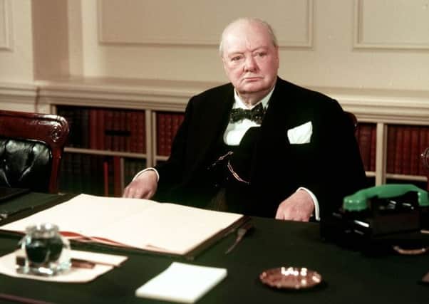 Sir Winston Churchill in the cabinet room at No.10 Downing Street.