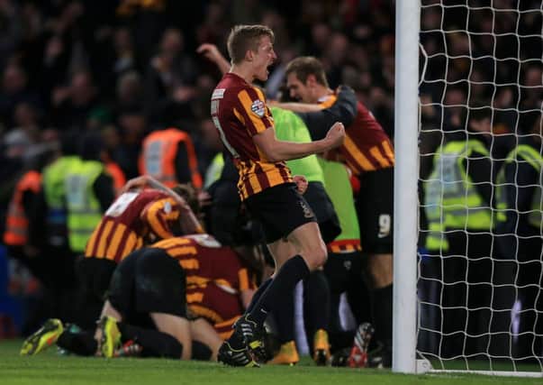 Bradford City captain Stephen Darby celebrates after Andy Halliday had made it 3-2 to the Bantams in their astonishing victory over Chelsea (Picture: John Walton/PA).