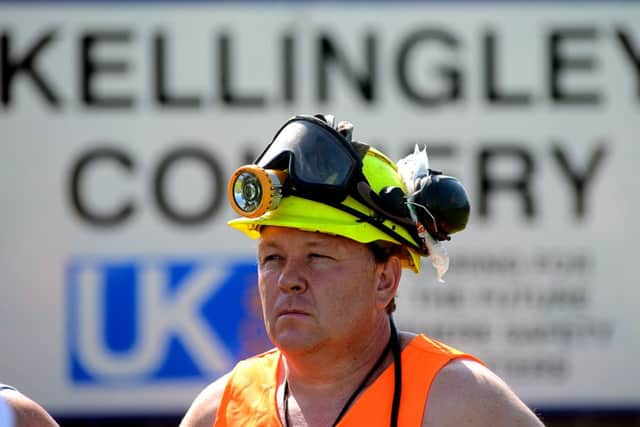 Miners at Kellingley Colliery during a press conference regarding the updated future of the pit. The workers buy out propsal has effectively been scuppered by UK Coal, meaning the coal mine will definately close.
p307p429