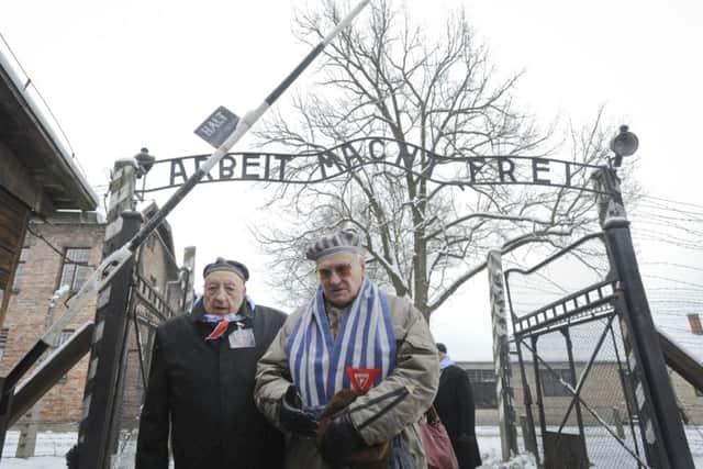 Holocaust Memorial day has been marked at the gate of the of the Auschwitz Nazi death camp in Oswiecim, and around the world.
