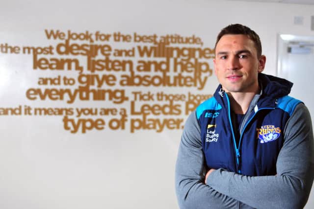 TICKING THE BOXES: Kevin Sinfield in front of a message of what it takes to become a Leeds Rhino. Picture: Tony Johnson