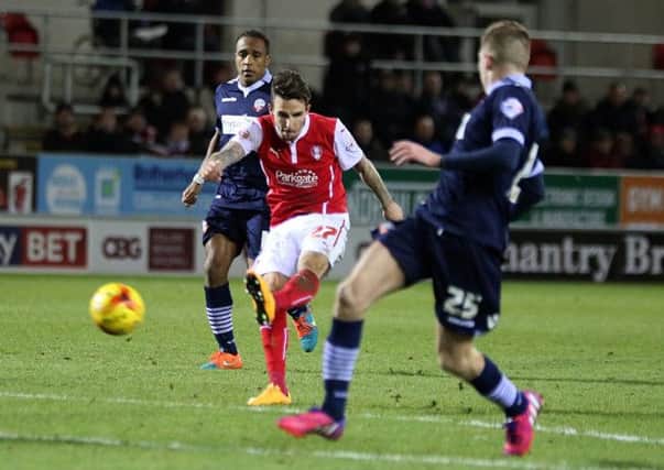 Matt Derbyshire scores his first goal for Rotherham United, their fourth on the night against Bolton (Picture: Paul Wickson).