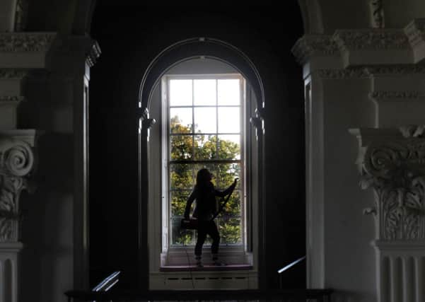 Bex Johnson,  a conservation volunteer at Beningbrough Hall  getting the house ready  for the York Residents' Weekend